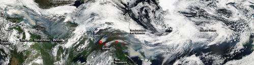 Satellite quilt of wildfires, smoke throughout Canada