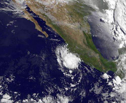 Satellite shows tropical storm dalila hugging Mexico's southwestern coast