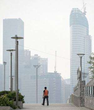 Singapore's financial district is seen shrouded in smoke on October 22, 2010 from forest fires in  Sumatra