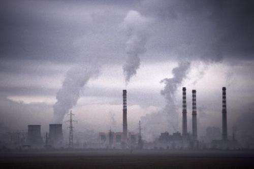 Smoke rising from stacks of a thermal power station in Sofia on February 14, 2013