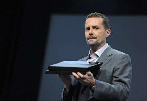 Sony CEO Andrew House unveils the new PlayStation 4 console at a press conference in Los Angeles on June 10, 2013