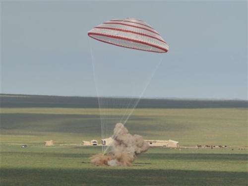 Space capsule returns from mission to Chinese lab