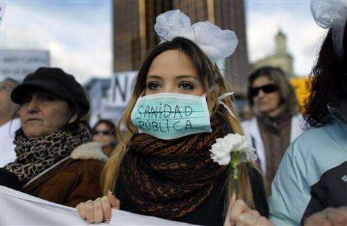 Spaniards protest health care reforms
