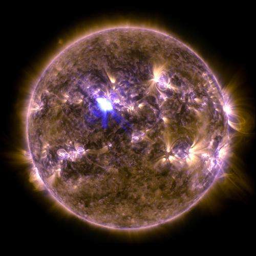 Spring fling: Sun emits a mid-level flare