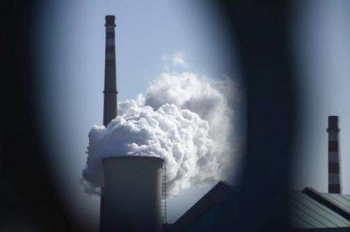 Steam rises from a power station in Beijing on December 5, 2012