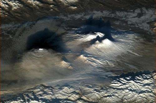 Stunning view from orbit: Dramatic volcanoes at dawn
