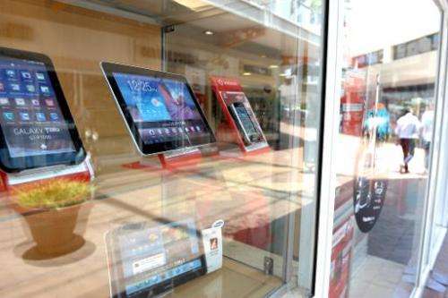 Tablets are displayed in a cell phone shop on November 14, 2012 in Johannesburg, South Africa