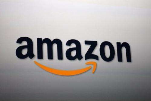 The Amazon logo is projected onto a screen at a press conference on September 6, 2012 in Santa Monica, California