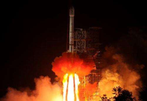 The Chang'e-3 rocket carrying the Jade Rabbit rover blasts off, from the Xichang Satellite Launch Center in the southwest provin