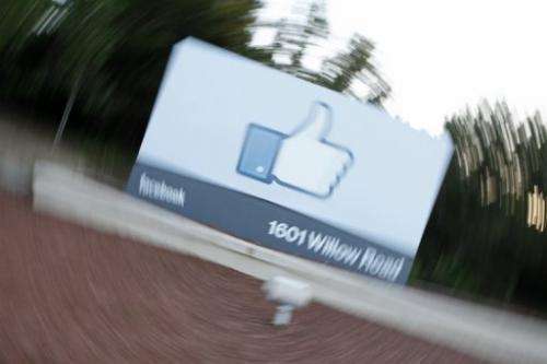 The Facebook's Like Button logo displayed at the entrance of the Facebook HQ in Menlo Park, California on May 18, 2012