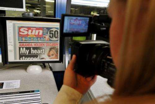 The front page of The Sun is seen on computer screen, in Broxbourne, outside London, on February 25, 201