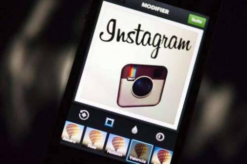 The Instagram logo is displayed on a smartphone on December 20, 2012 in Paris