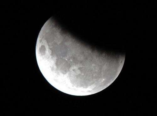 The moon is 37 per cent obscured by the Earth's shadow during the partial lunar eclipse above Sydney on June 4, 2012
