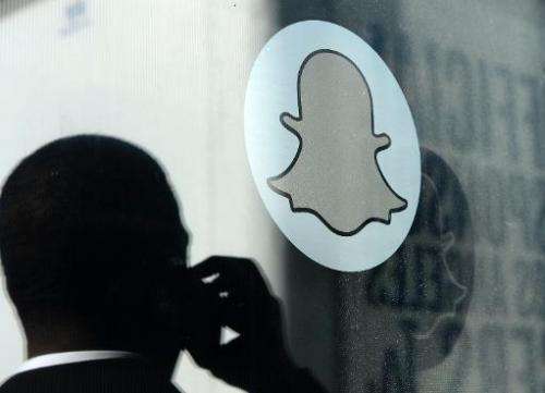 The Snapchat logo is seen at the front entrance to the messaging company's new headquarters in California, pictured November 14,