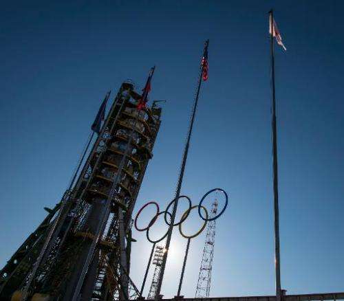 This NASA handout photo shows Olympic rings at the Soyuz launch pad shortly after the Soyuz TMA-11M rocket was erected into posi