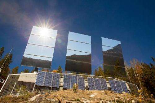 Three giant mirrors errected on the mountainside above Rjukan, Norway, reflect sunshine towards the center of the town, on Octob