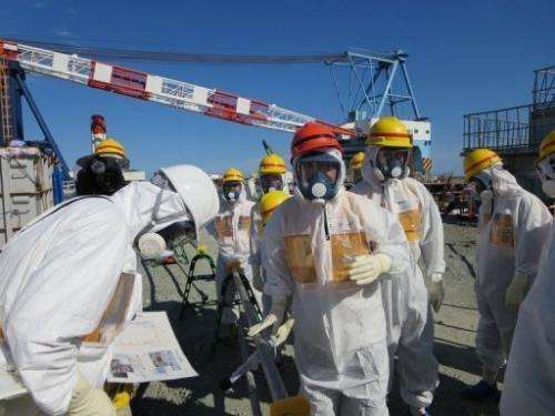 Toshimitsu Motegi, the Japanese Economy, Trade and Industry Minister, inspects the Fukushima plant on August 26, 2013