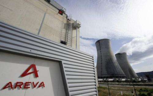 Two giant towers emit steam at the Areva plant in Tricastin, France, on April 4, 2011