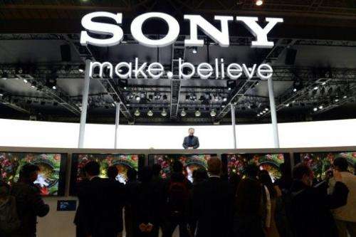 Visitors gather at the Sony booth during a show in Yokohama, on January 31, 2013