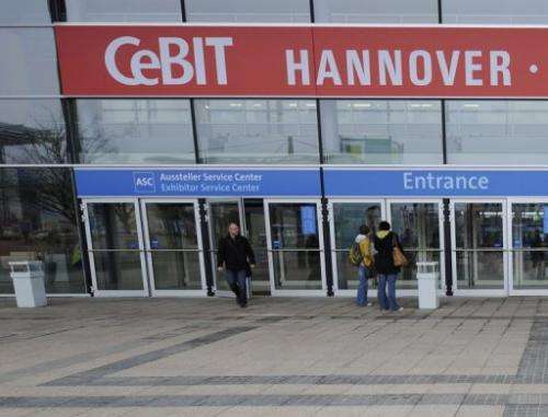 Visitors leave the world's biggest high-tech fair, the CeBIT, in Hanover March 5, 2009