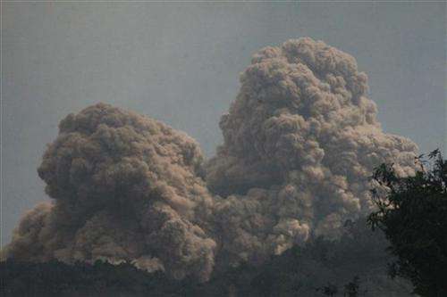 Volcano spews more hot ash, lava in east Indonesia
