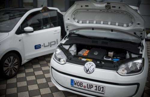 VW e-up! electric cars from German carmaker Volkswagen, on display during a press event on September 4, 2013