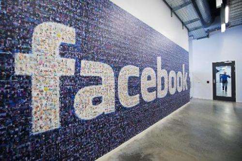 A logo created from pictures of Facebook users worldwide is pictured in the company's Data Center on November 7, 2013 in Lulea, 