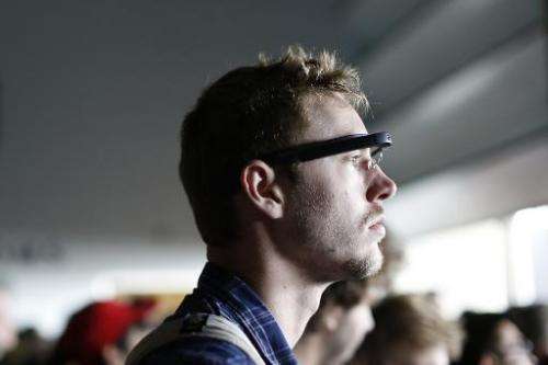 An attendee wears a Google Glass during the Google I/O Developers Conference at Moscone Center in San Francisco, California, on 