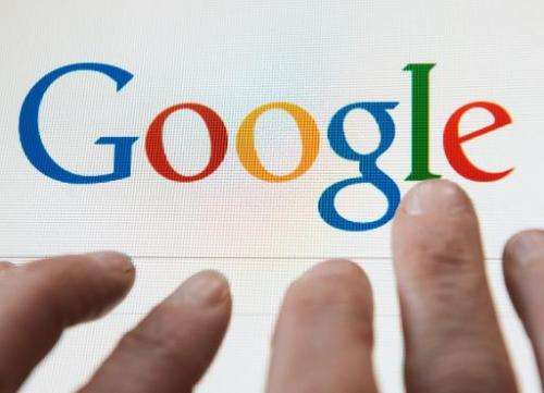 A person prepares to search the internet using the Google search engine, on May 14, 2014, in Lille, France