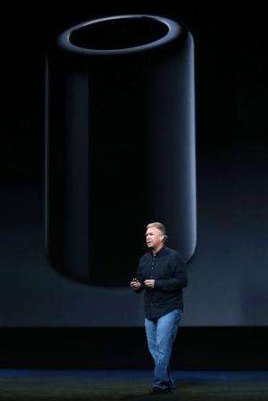 Apple Senior Vice President of Worldwide Marketing Phil Schiller announces the new Mac Pro during an Apple announcement at the Y
