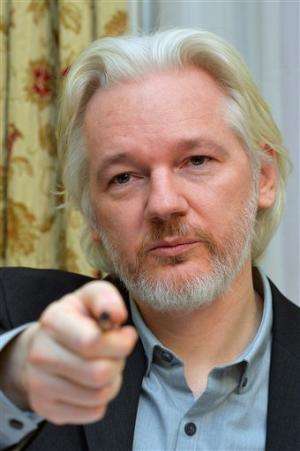 Assange talks of leaving embassy, sowing confusion