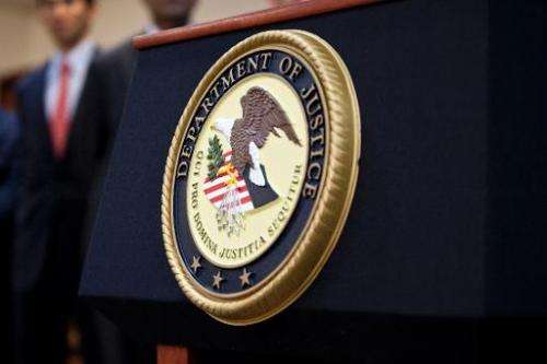A US Department of Justice seal is displayed on a podium on December 11, 2012 in the Brooklyn borough of New York City