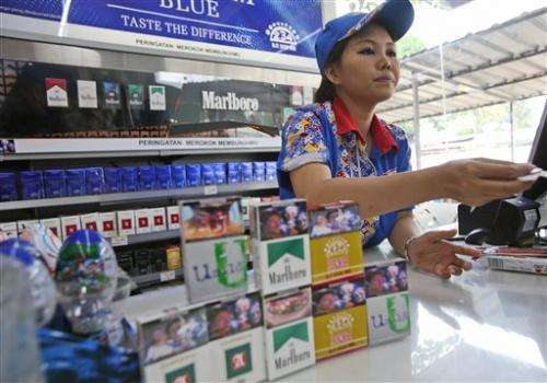 Big tobacco ignores Indonesia health warning law (Update)