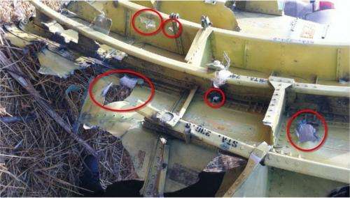 Damage to the cockpit gives a clue to loss of flight MH17