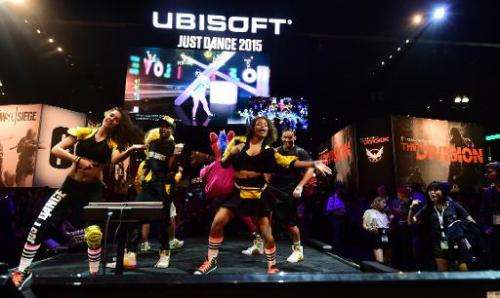 Dancers perform at Ubisoft's 'Just Dance 2015' at the annual E3 video game extravaganza in Los Angeles on June 10, 2014