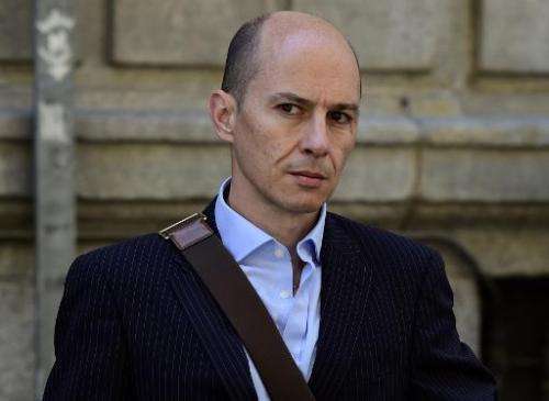 Disgraced ex-boss of Spanish wifi provider Let's Gowex Jenaro Garcia Martin leaves the courthouse in Madrid in July 2014