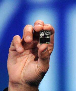 Intel Corp. CEO Brian Krzanich introduces &quot;Intel Edison,&quot; a tiny Intel-based computer, during his pre-show keynote add