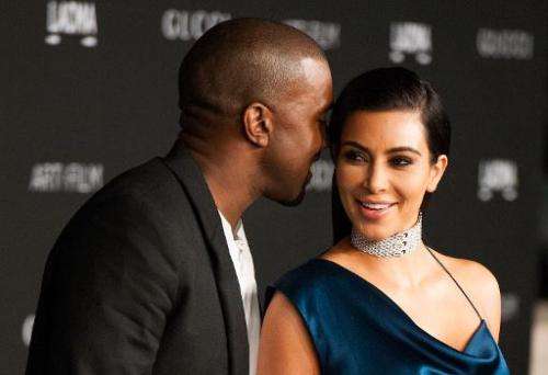 Kim Kardashian and her husband, recording artist Kanye West, pictured in Los Angeles on November 1, 2014