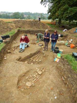 ‘Lost chapel’ skeletons found holding hands after 700 years