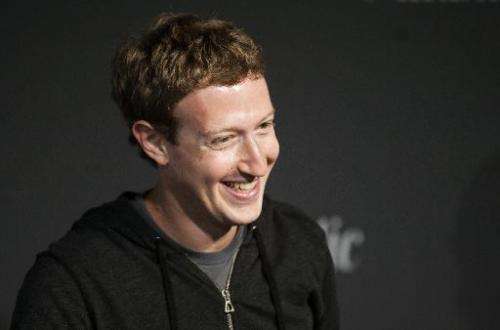 Mark Zuckerberg surprised a hall full of Chinese and international students when he kicked off a question-and-answer session at 