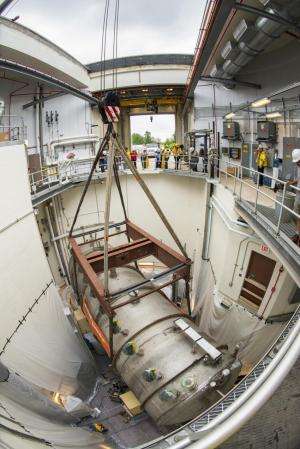 Massive 30-ton MicroBooNE particle detector moved into place, will see neutrinos this year