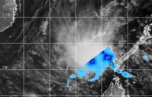 NASA sees remnants of TD04W dissipating in South China Sea