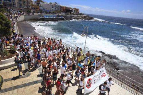 People protest against oil and gas exploration by Spanish group REPSOL off the coast of the Canary Islands, on the Spanish Canar
