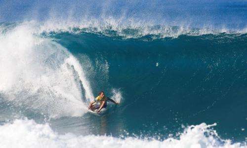 Professional surfer back in the water after successful surgery to treat rare bone cancer