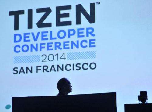 Samsung Executive Vice President Jong-Deok Choi watches a video during the Tizen Developer Conference in San Francisco, Californ