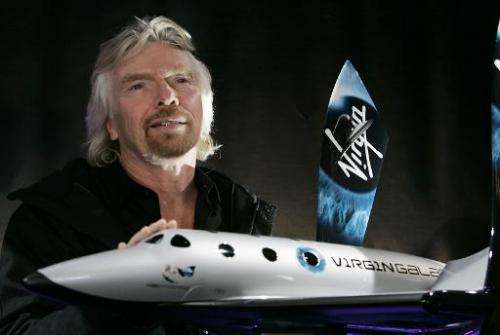 Sir Richard Branson, founder of Virgin Galactic, is seen with a model of the Spaceship Two at the America Museum of Natural Hist