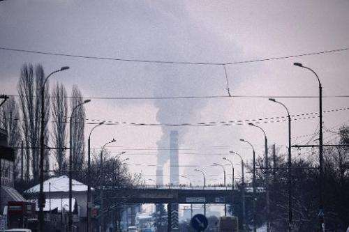 Smoke rises from the stacks of a thermal power station in Pernik on January 28, 2014
