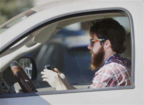 Survey finds people text and drive knowing dangers