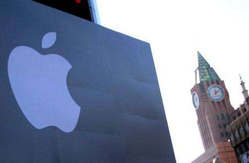 The Apple logo is seen outside the store in Beijing on December 22, 2013