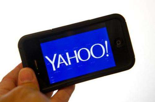 This September 12, 2013 photo illustration shows the Yahoo logo on a smartphone